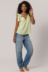 Blusa em plano tencel com nó frontal