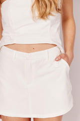 Short Saia Luminare em Alfaiataria com Bolsos